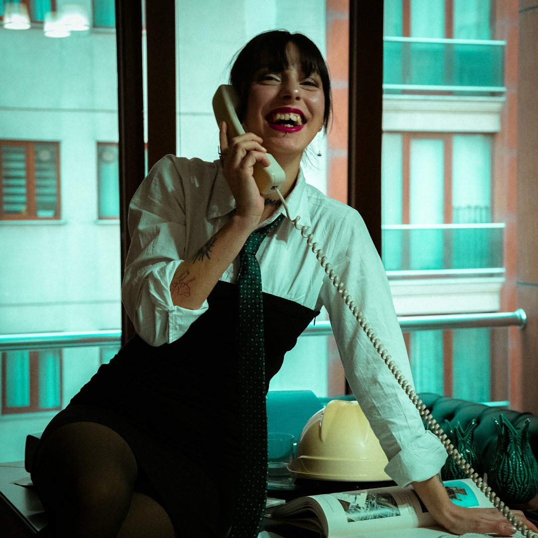 Professional Belgian woman AI research director smiling in office