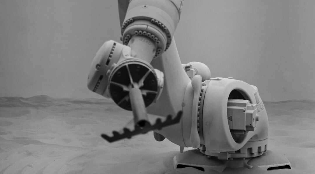 Advanced humanoid robot with white chassis in modern laboratory